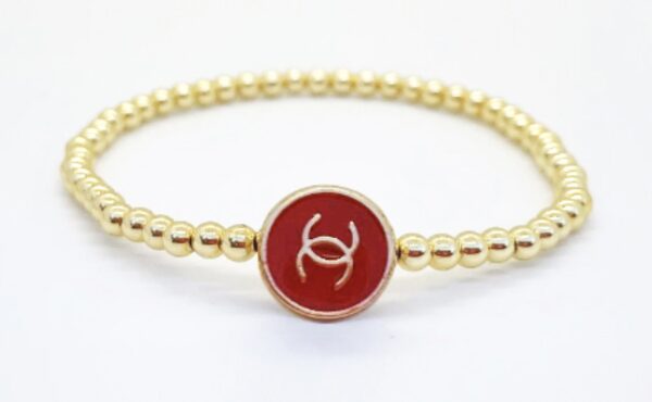 CC Single Strand Gold and Red Bracelet